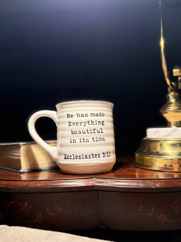 A lovely coffee mug with a scripture, a light shinning 